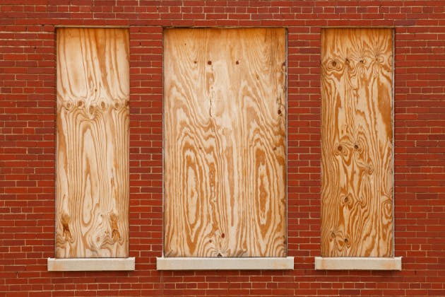 What happens during an emergency boarding up service